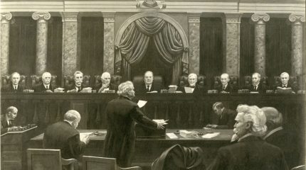 artist's sketch of lawyer in foreground standing and speaking with nine justices listening in background