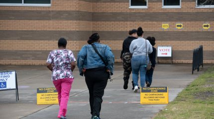 Voters walking into a voting site.