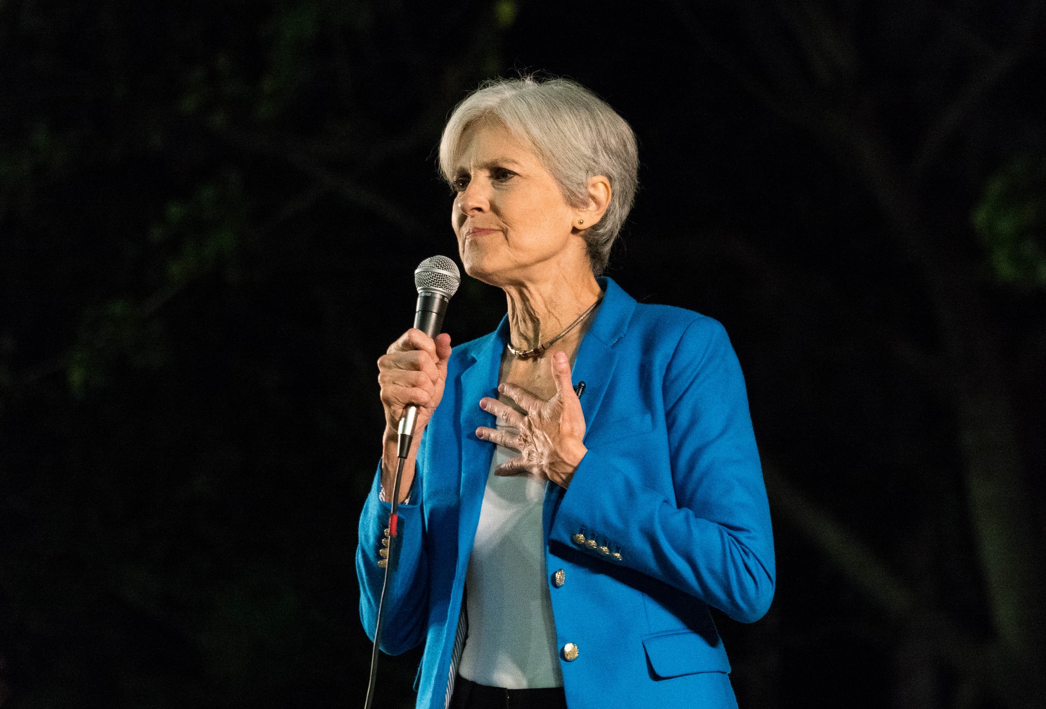 Jill Stein speaking into microphone