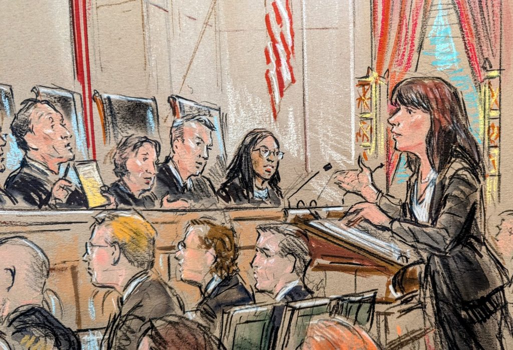 Woman speaks to justices on the bench