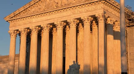 The Supreme Court building at sunset