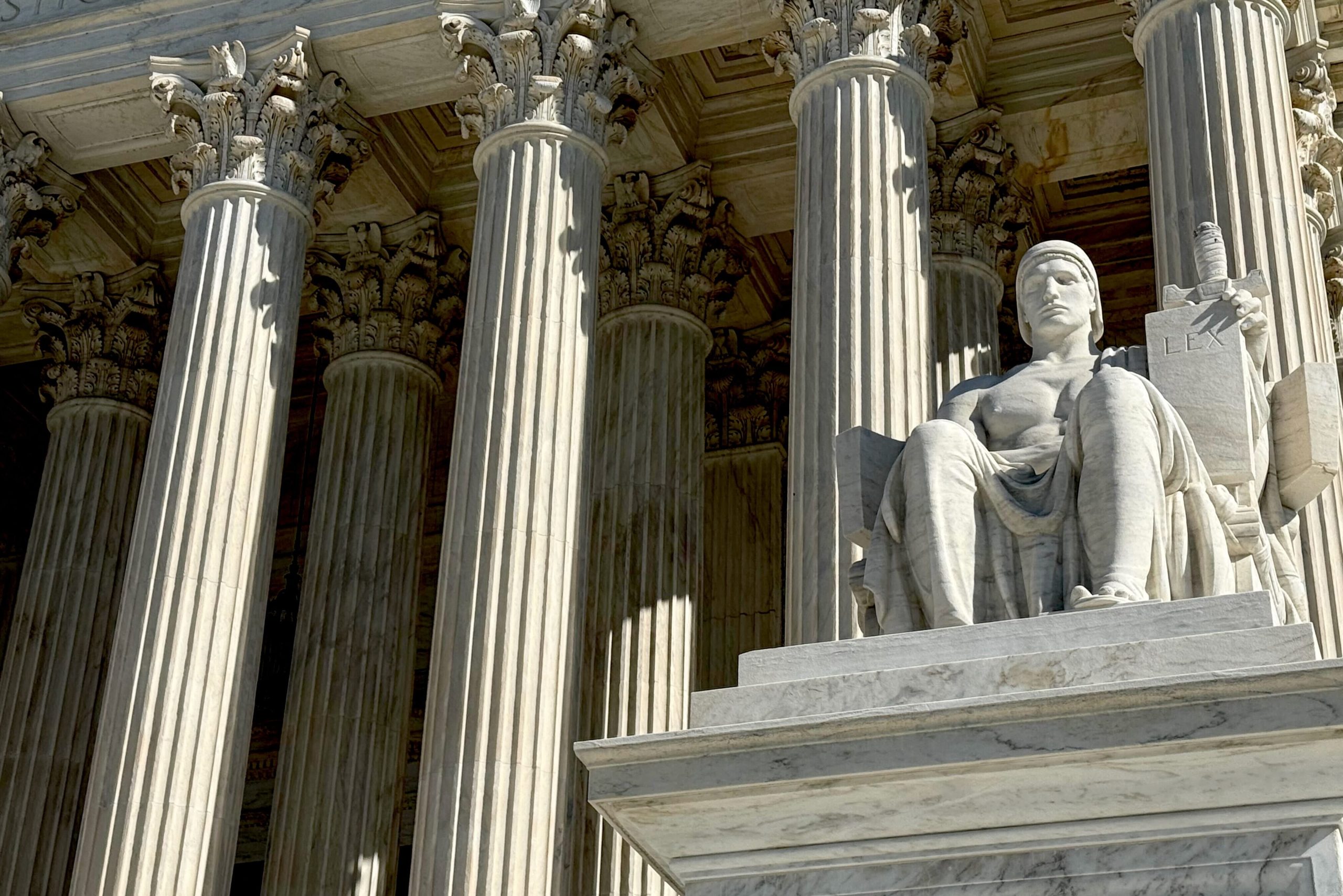 The columns and statute in front of the Supreme Court