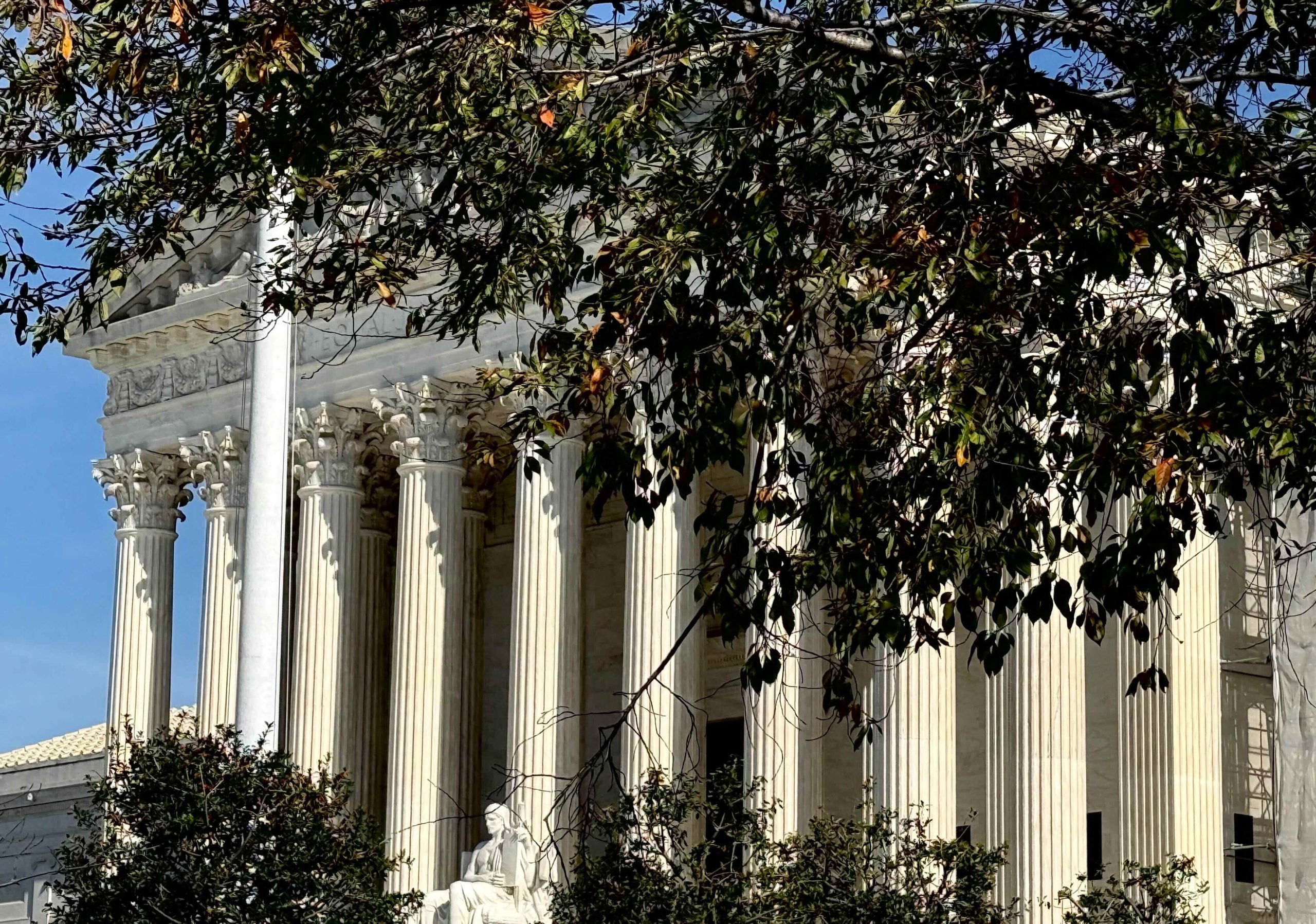 Supreme Court building with fall foliage