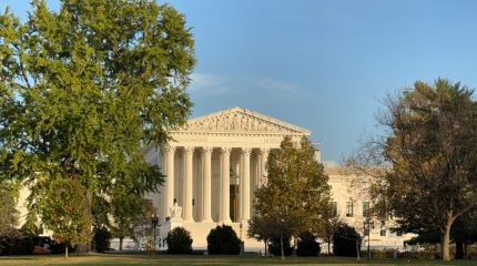 Supreme Court building with trees