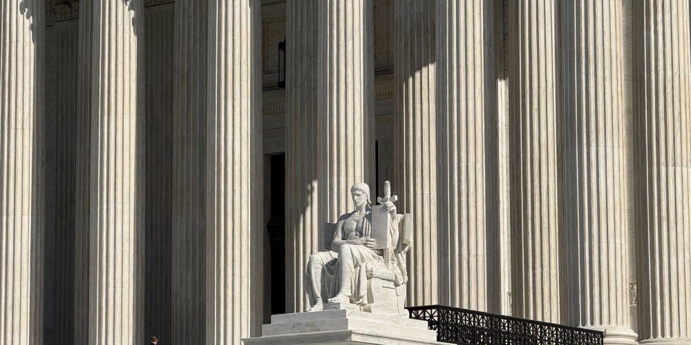 A statue on the Supreme Court steps.