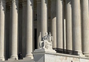 A statue on the Supreme Court steps.