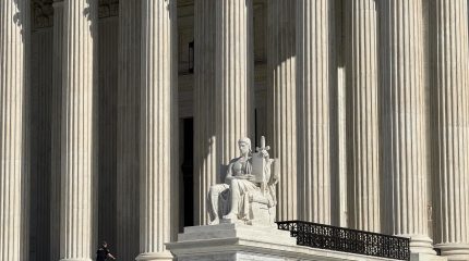 Statue in front of the Supreme Court steps