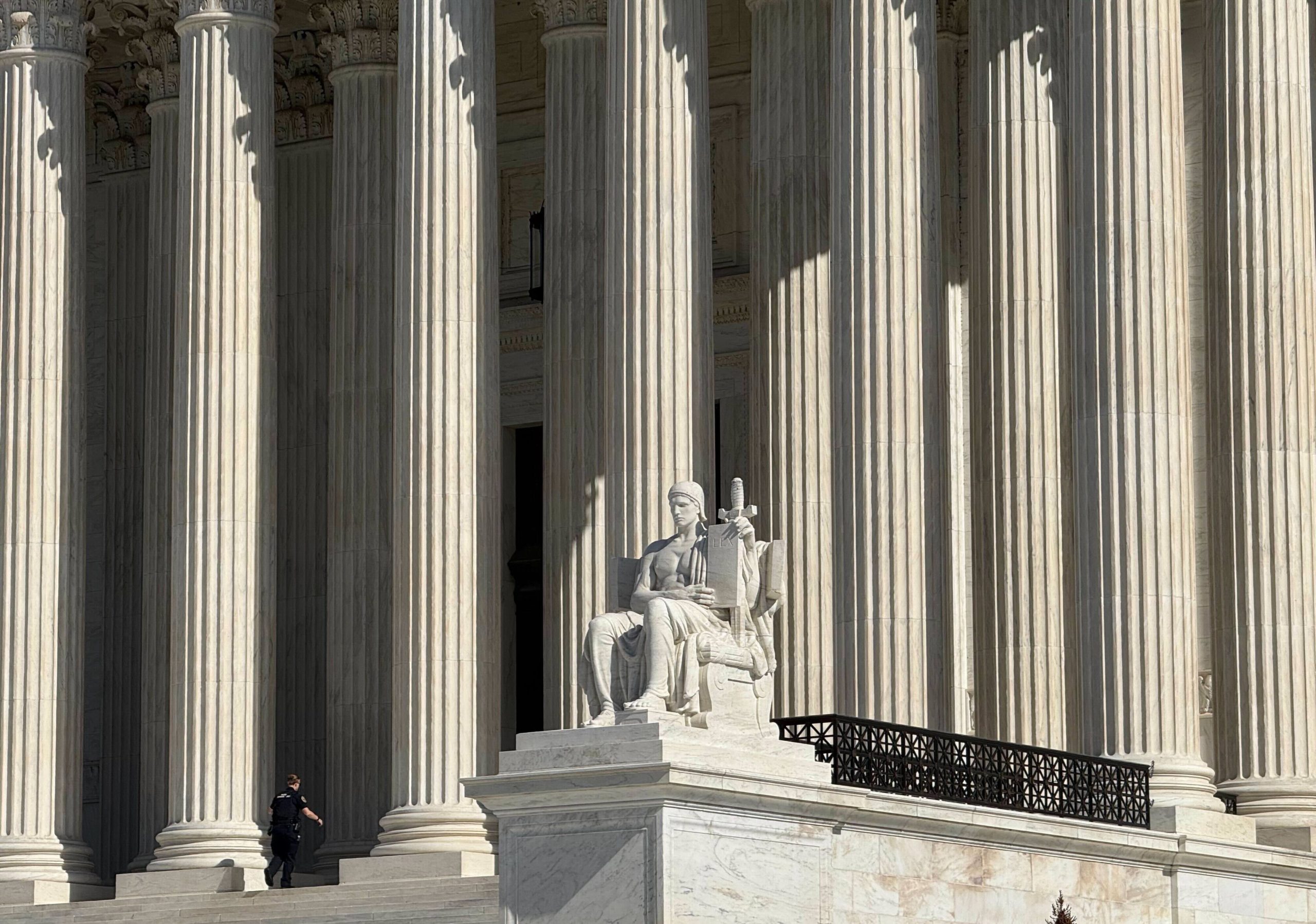 A statue on the Supreme Court steps.