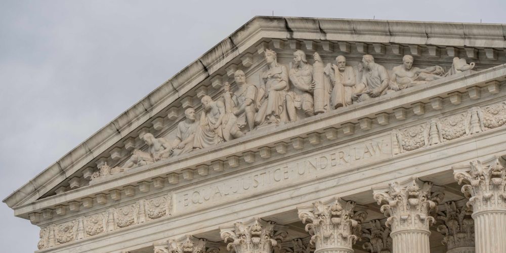 The carving above the Supreme Court steps