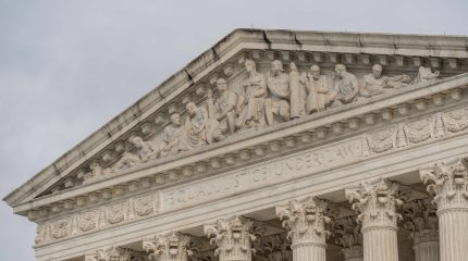 The carving above the Supreme Court steps