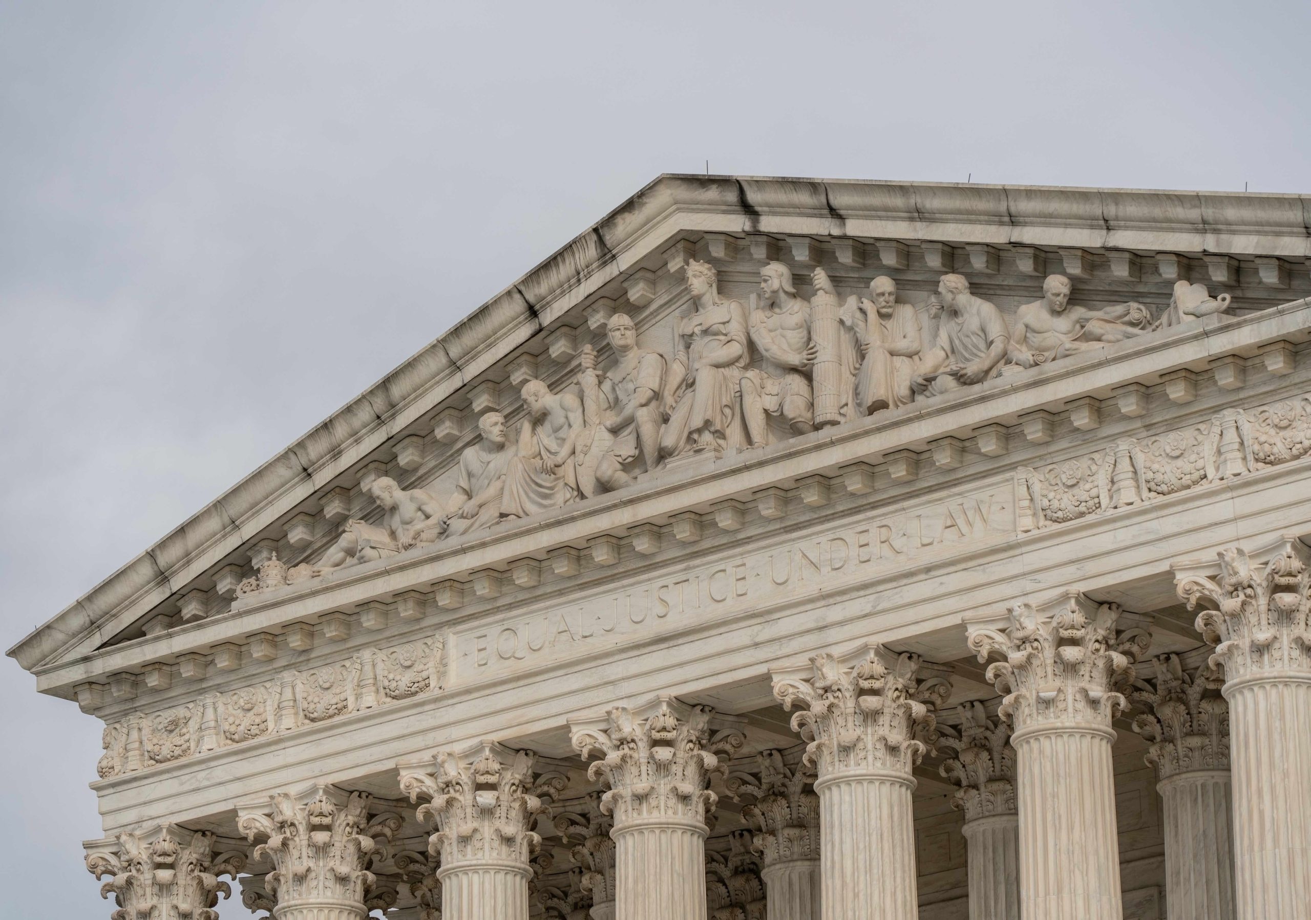 The carving above the Supreme Court steps