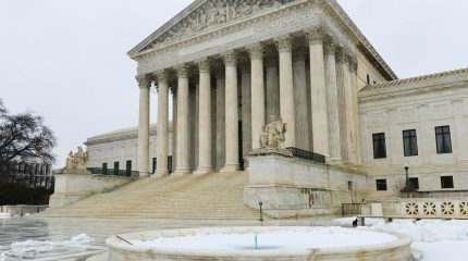 U.S. Supreme Court building in snow.